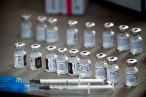 Syringes and vials of the Pfizer-BioNTech Covid-19 vaccine are prepared to be administered to health care workers in Reno, Nevada, on December 17. 