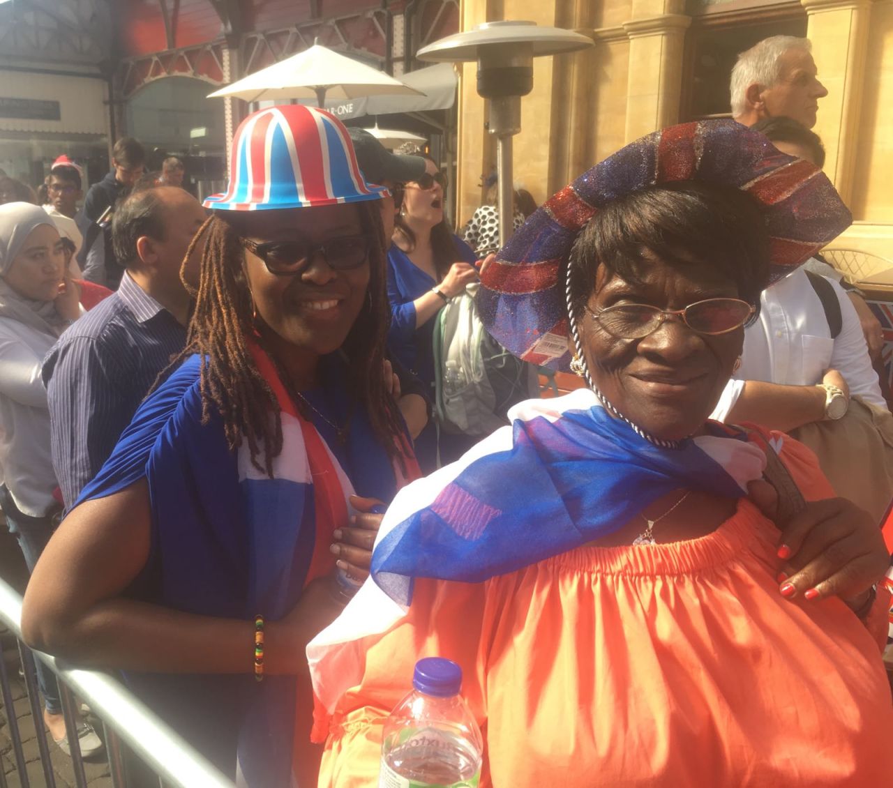 Tiful, left and her mother, Monica, right, traveled from the US and Cameroon respectively to be part of Prince Harry and Meghan's day.
