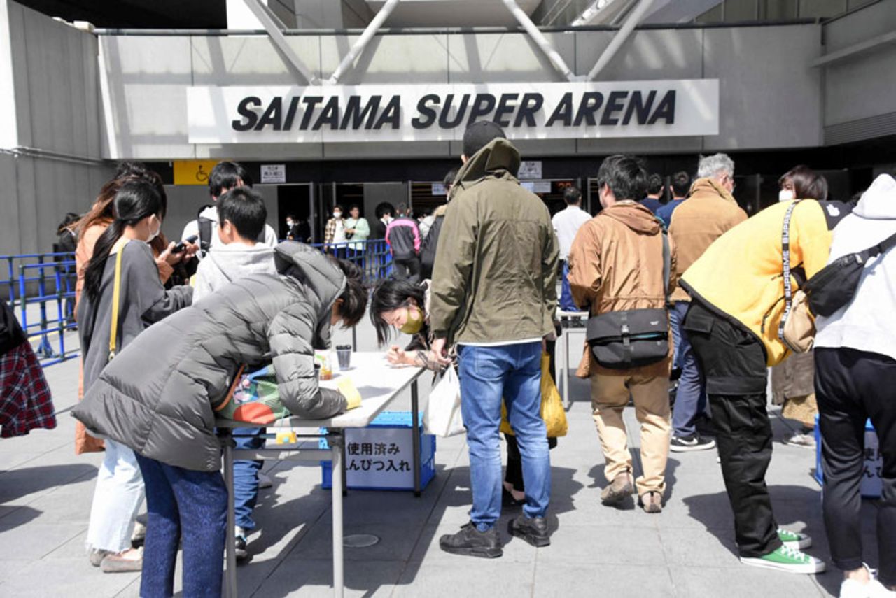 Fans enter the Saitama Super Arena in Saitama, Japan, on Sunday, March 22, for the K-1 World GP event.