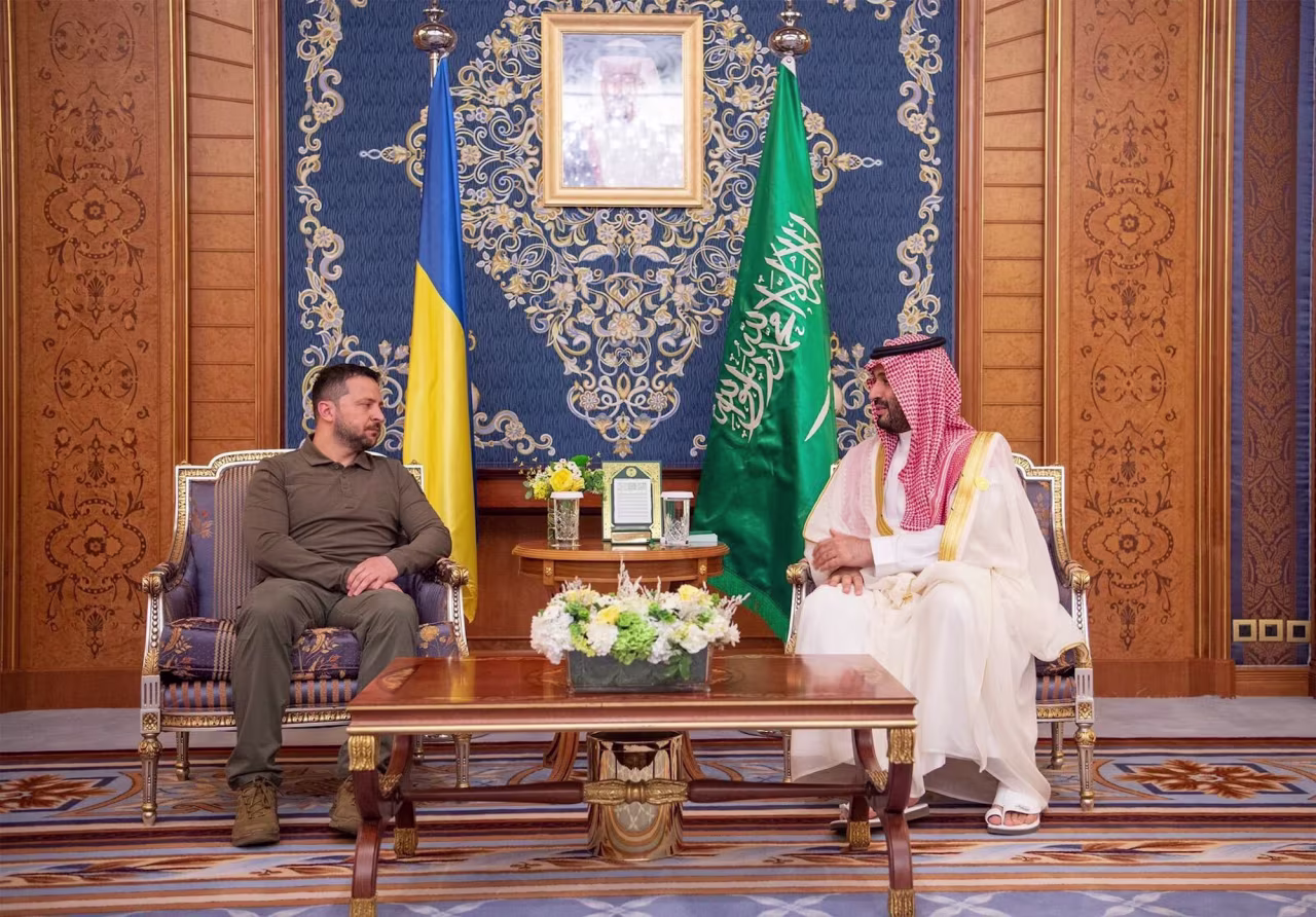 A photo from May 19 shows Saudi Arabian Crown Prince Mohammed bin Salman, right, meeting Ukrainian President Volodymyr Zelensky in Jeddah, Saudi Arabia.