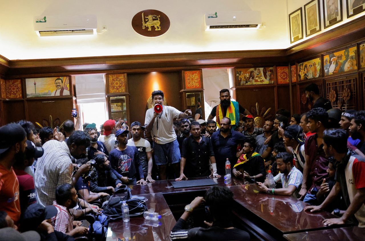 Demonstrators celebrate after they entered into?Sri?Lankan Prime Minister Ranil Wickremesinghe's office during a protest demanding for his resignation in Colombo,?Sri?Lanka, on July 13.