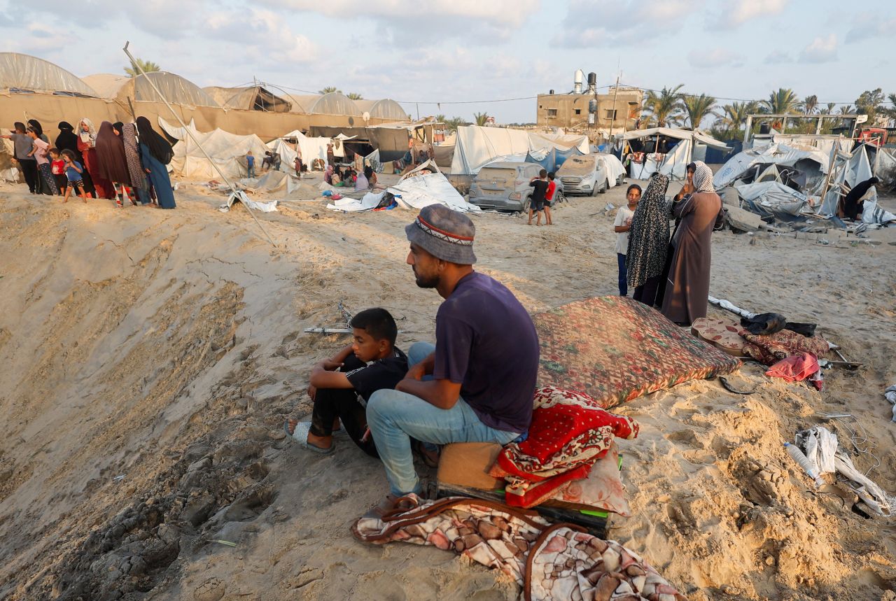 Palestinians inspect the site following Israeli strikes on a tent camp sheltering displaced people in?Al-Mawasi, Khan Younis, on September 10.