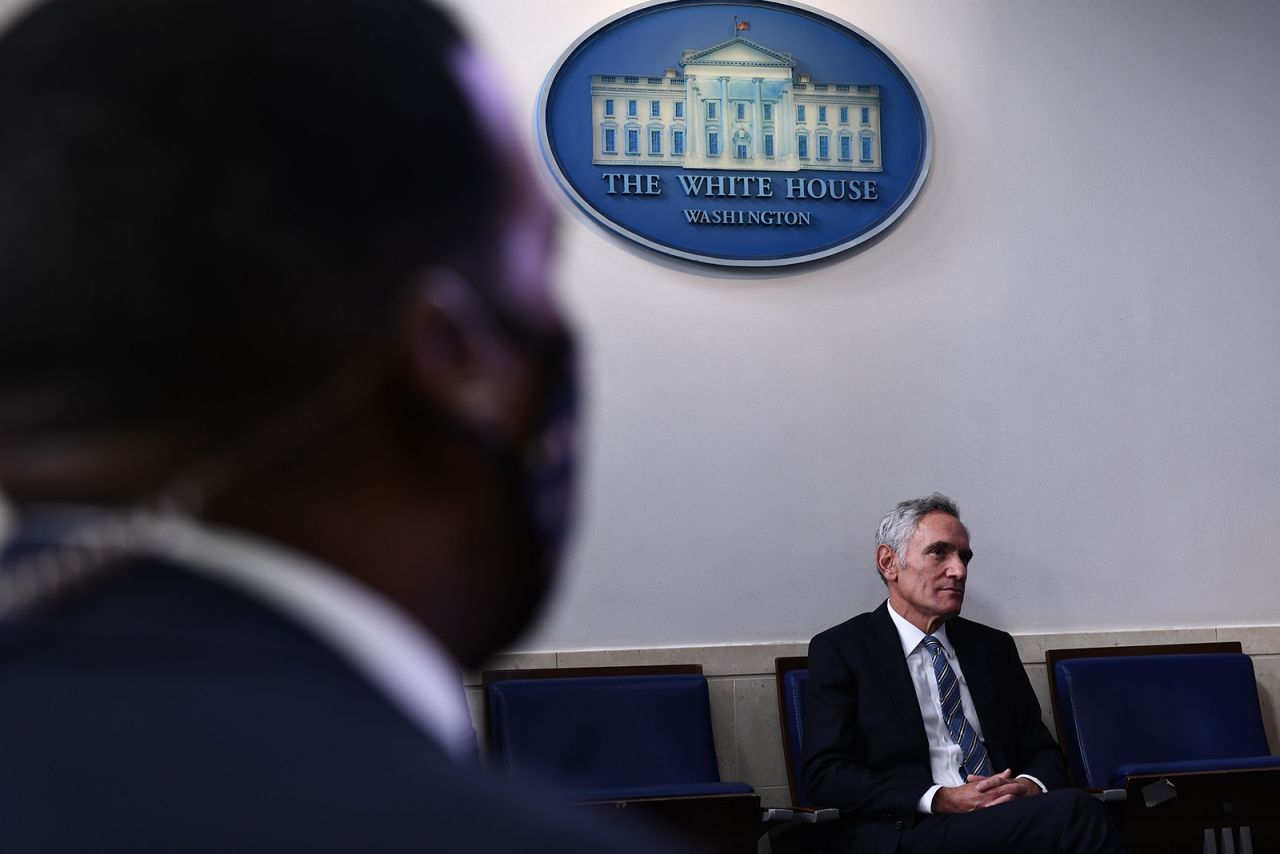 Dr. Scott Atlas listens as President Donald Trump speaks during a news conference in the Brady Briefing Room of the White House in Washington on August 13.