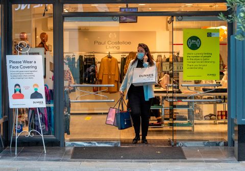 A shopper exits a store in Grafton Street in Dublin on Oct. 21.