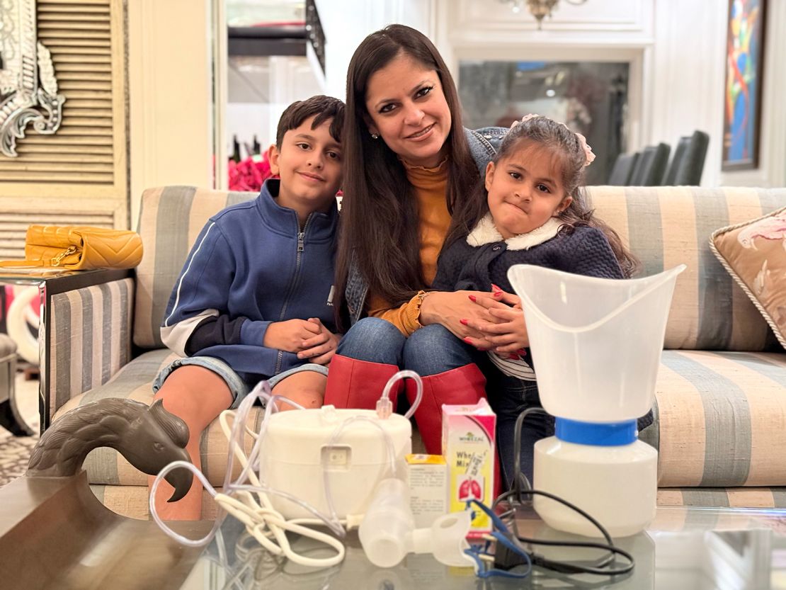 Amrita Rosha with her children Vanaaya, 4, and Abhiraj, 9, in her bungalow in South Delhi.