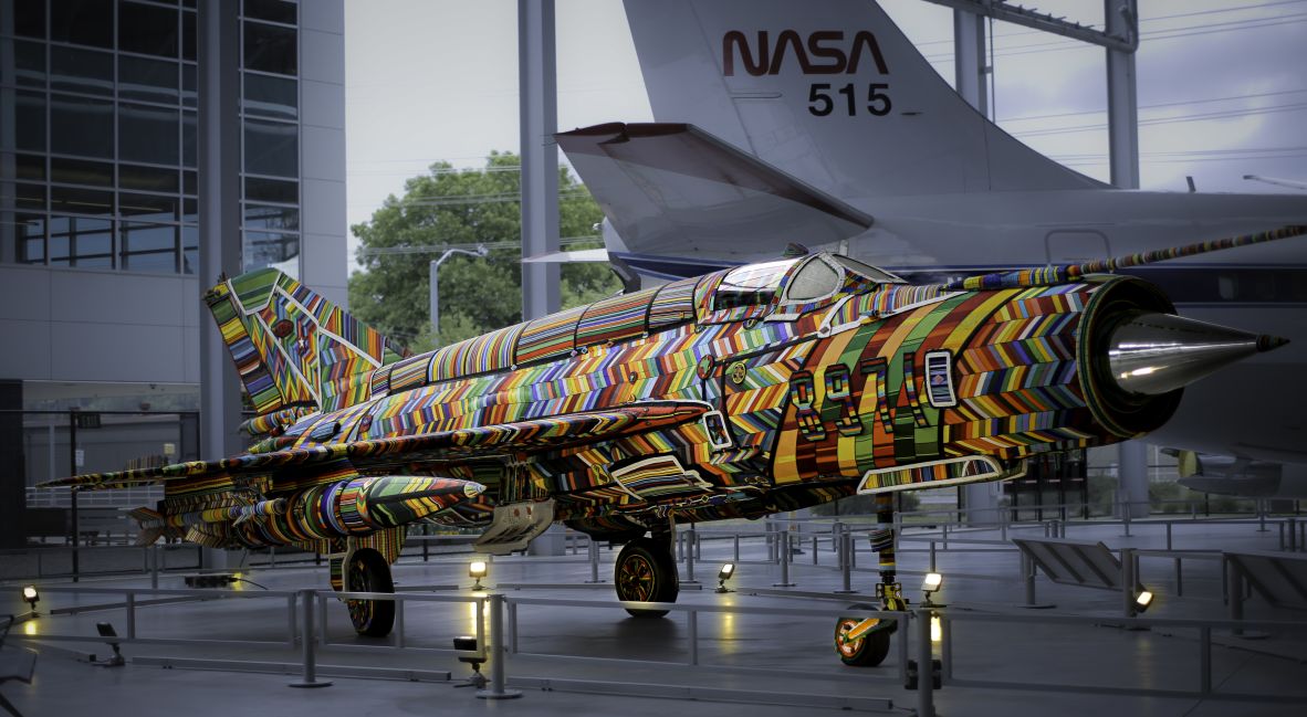 The aircraft, which is over 50 feet (15 meters) long, debuted at The Museum of Flight in Seattle in June. The artwork required approximately 35 million beads threaded by hand, and took a team of 100 people over 5 years to complete.
