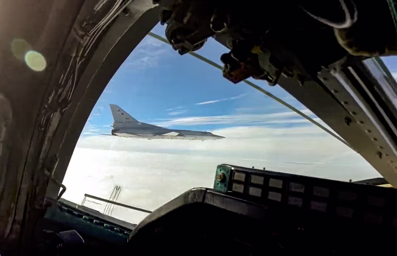 In this handout photo from a video released by Russian Defense Ministry Press Service on Wednesday, November 10, 2021 shows a long-range Tu-22M3 bomber of the Russian Aerospace Forces on patrol over Belarus.