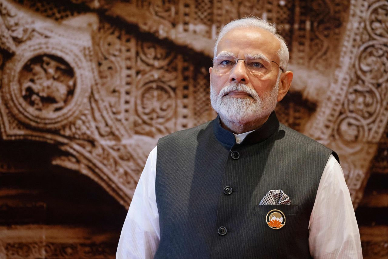 Indian Prime Minister Narendra Modi waits to welcome the leaders of the G20 countries at the Bharat Mandapam in New Delhi on September 9.