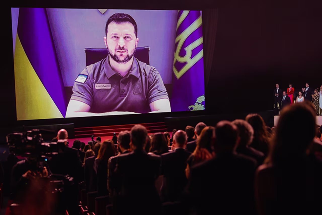 Ukraine's President Volodymyr Zelensky addresses the Cannes Film Festival on Tuesday.