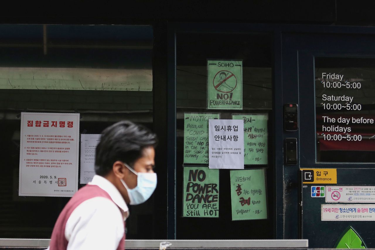 Notices are posted at the entrance of a closed nightclub in Seoul on Sunday.