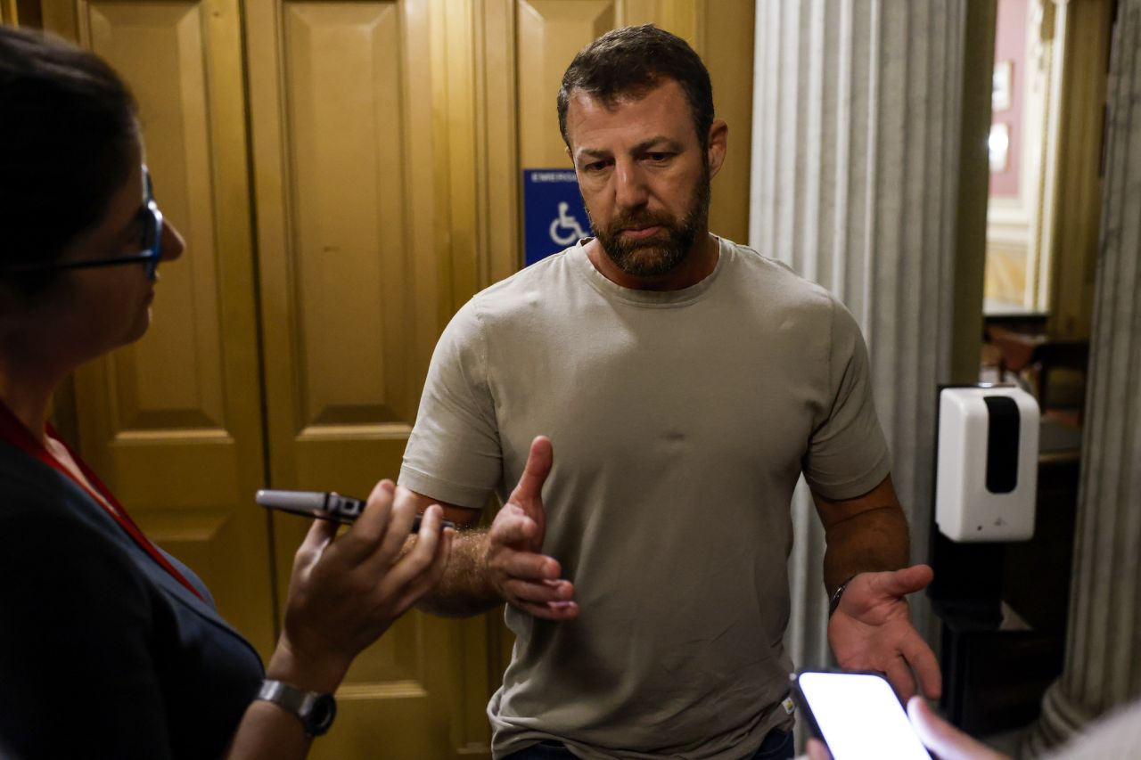 Sen. Markwayne Mullin speaks to reporters during a vote on Saturday.