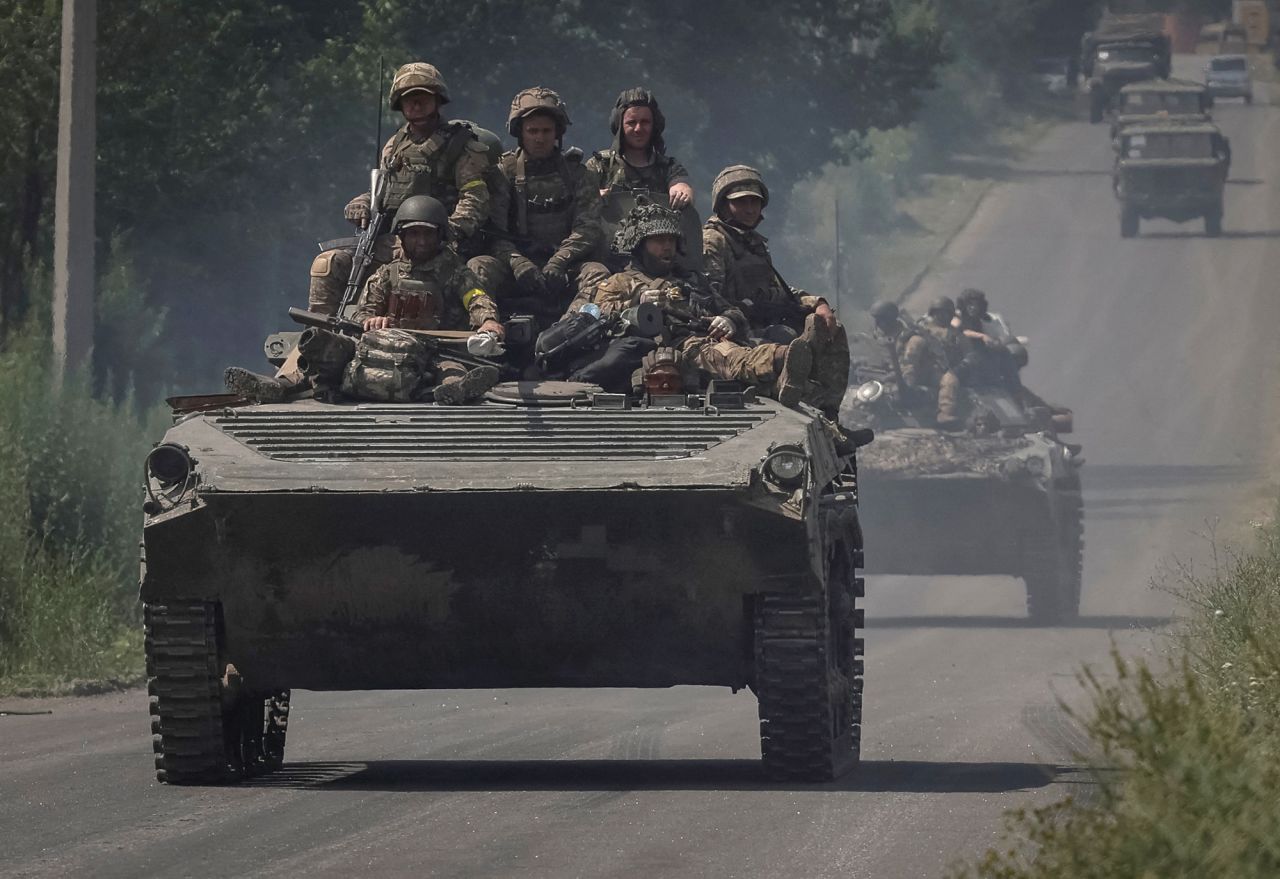 Ukrainian servicemen ride BMP-1 infantry fighting vehicles in the Donetsk region, Ukraine, on June 14.