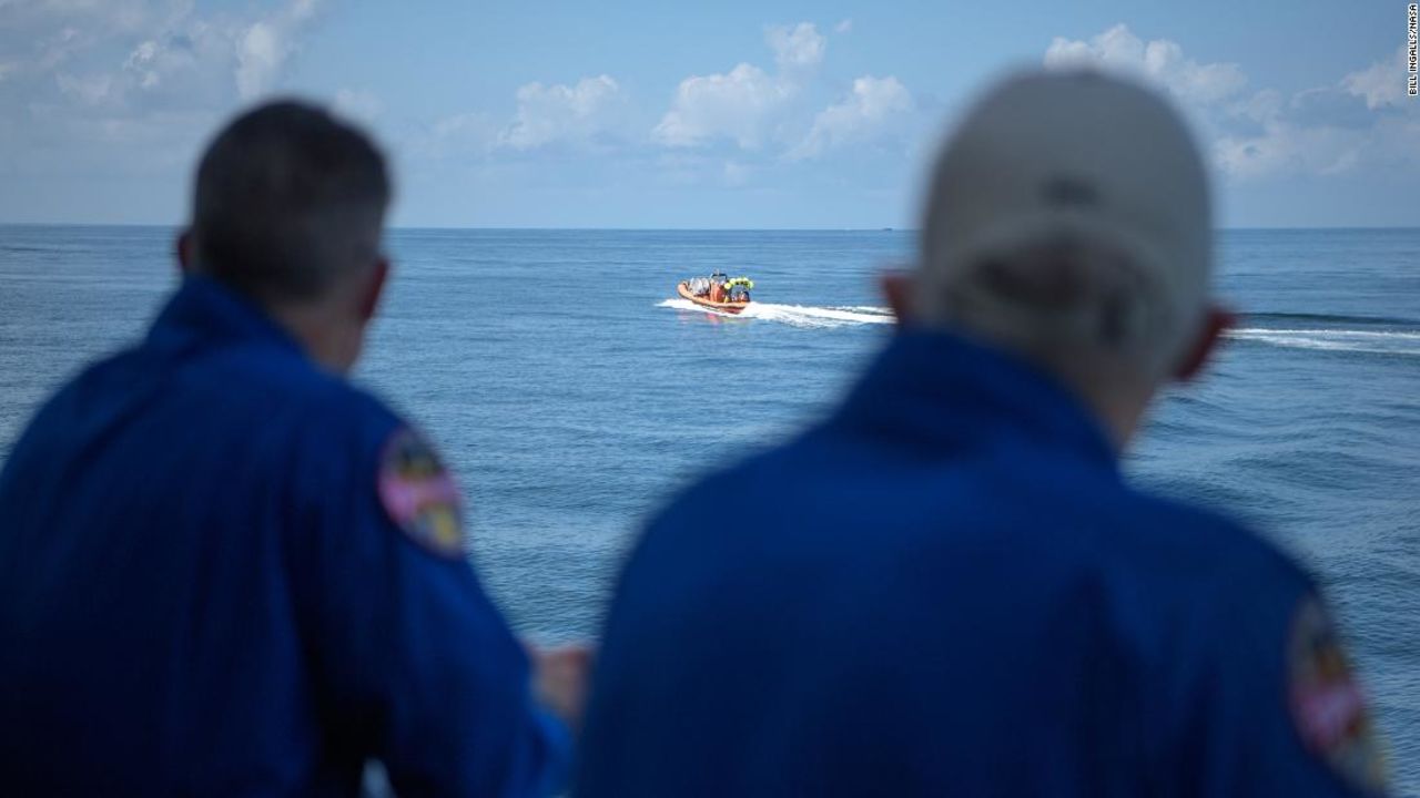 NASA astronaut and Crew Recovery Chief Shane Kimbrough, left, and NASA Chief Astronaut Pat Forrester watch as SpaceX support teams are deployed on fast boats from the SpaceX GO Navigator recovery ship ahead of the landing of the SpaceX Crew Dragon Endeavour spacecraft with NASA astronauts Robert Behnken and Douglas Hurley onboard, Sunday, Aug. 2, 2020 in the Gulf of Mexico off the cost of Pensacola, Florida.?