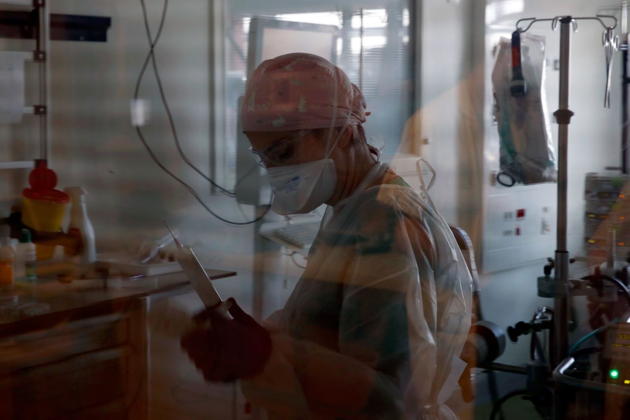 A medical worker tends to a Covid-19 patient at Amiens-Picardie hospital on March 30 in Amiens, France.