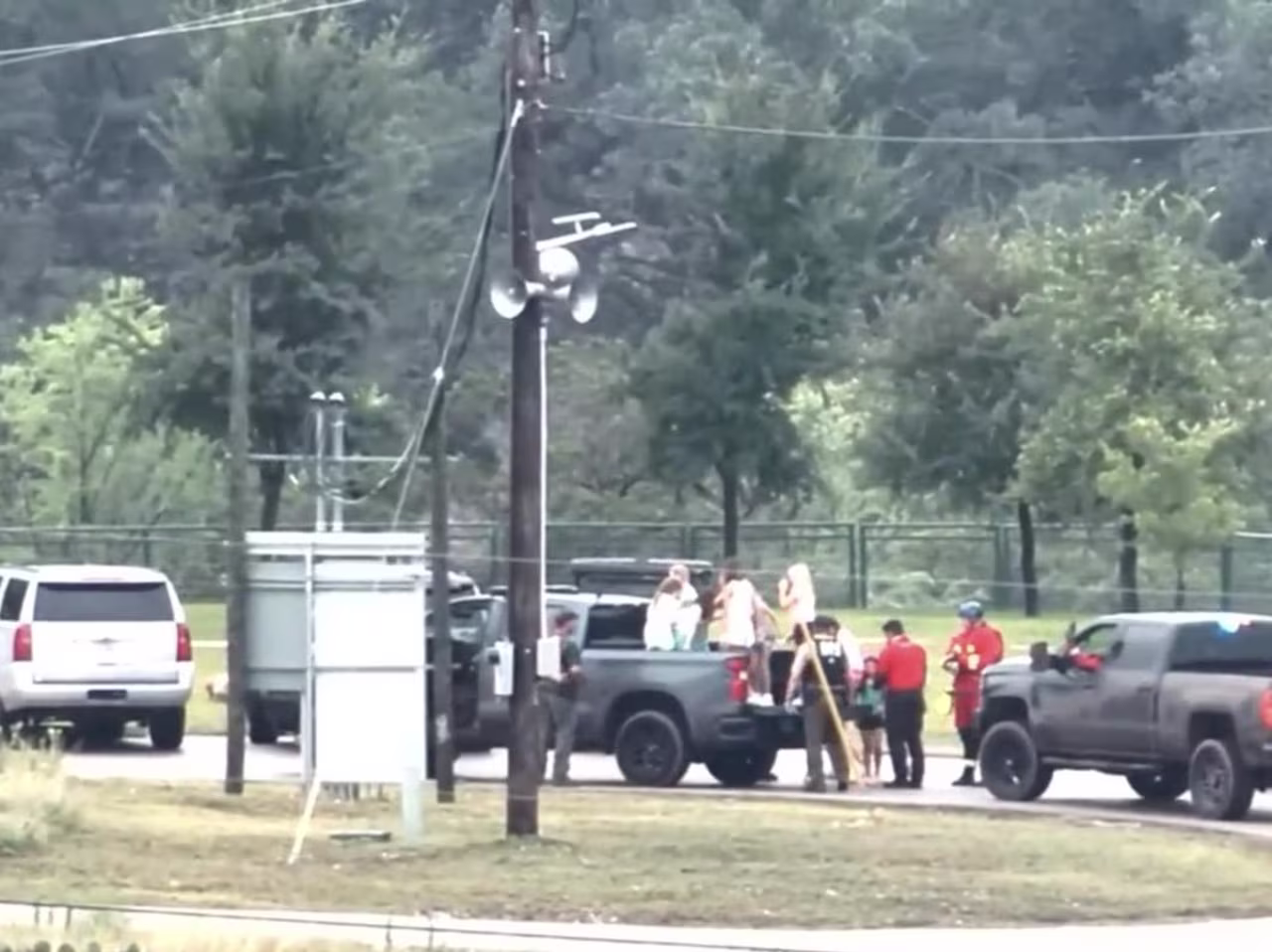 An image posted to the Texas Game Warden's Facebook page shows trucks arriving at Camp Mystic to assist with evacautations on Friday, July 4.