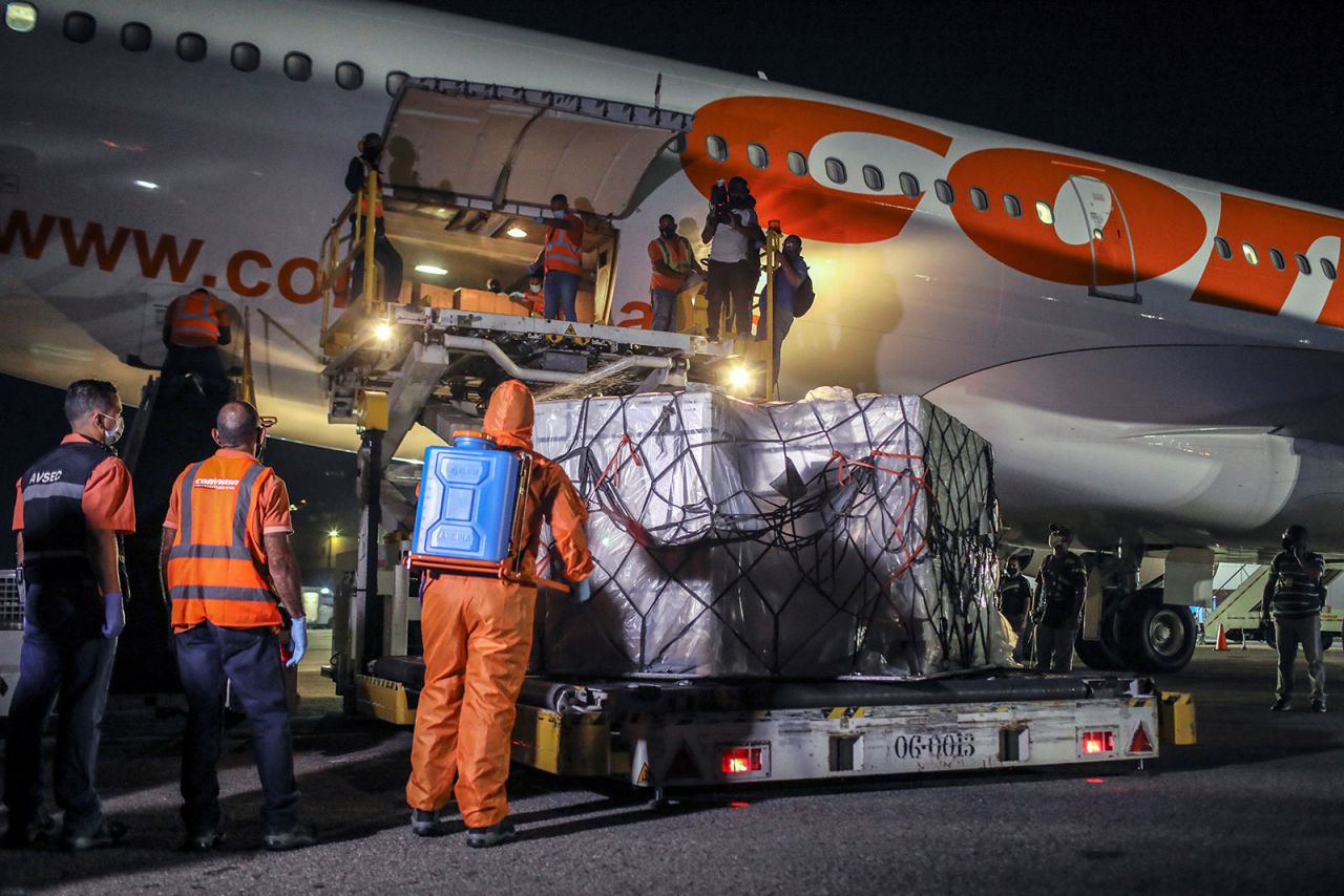 A shipment of China's Sinopharm vaccine is unloaded in Caracas, Venezuela, on March 1.