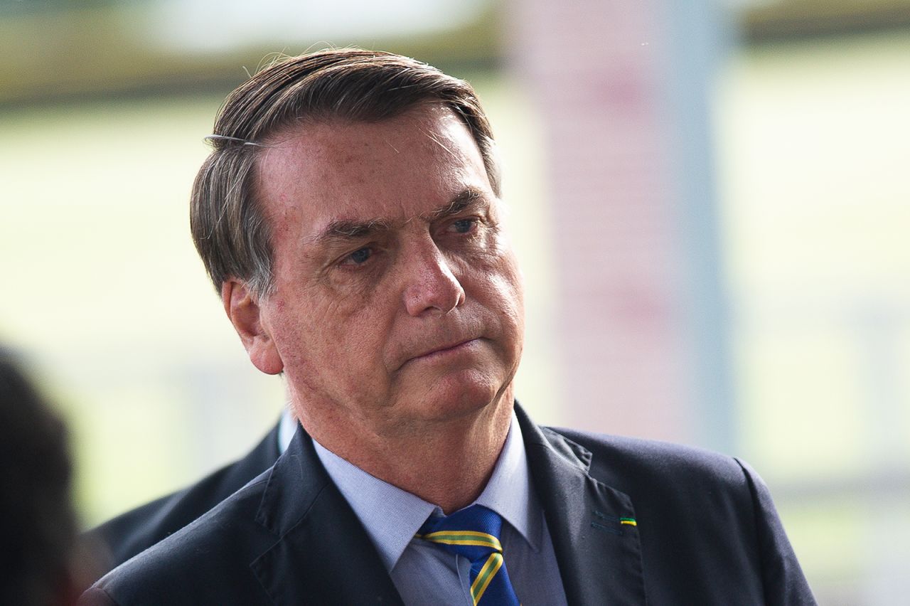 Brazilian President Jair Bolsonaro talks to supporters of his government on Wednesday, May 6, in Brasilia.