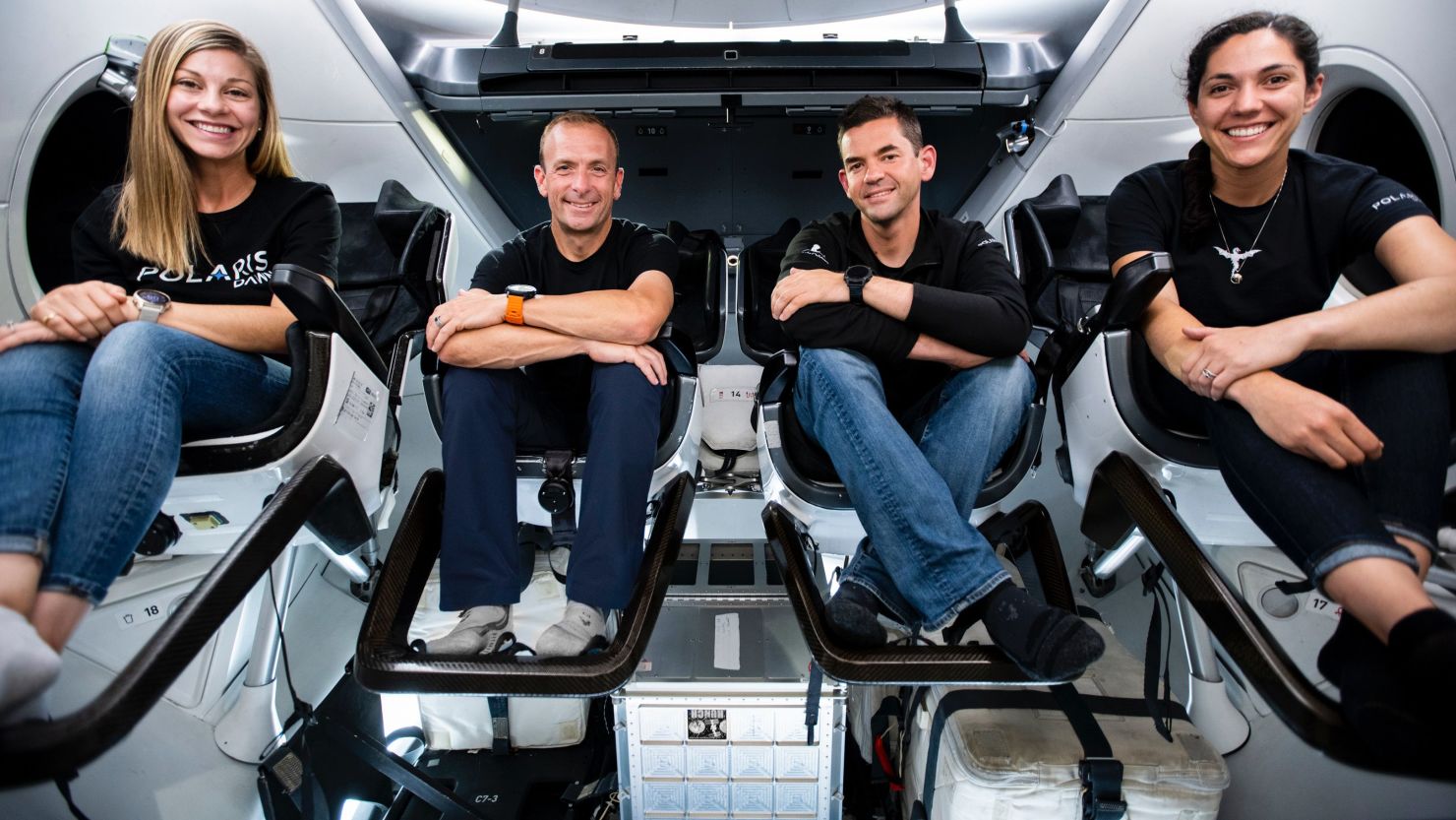 Polaris Dawn crew members — including (from left) Anna Menon, Scott "Kidd" Poteet, Jared Isaacman and Sarah Gillis — are seen inside a SpaceX Crew Dragon capsule.
