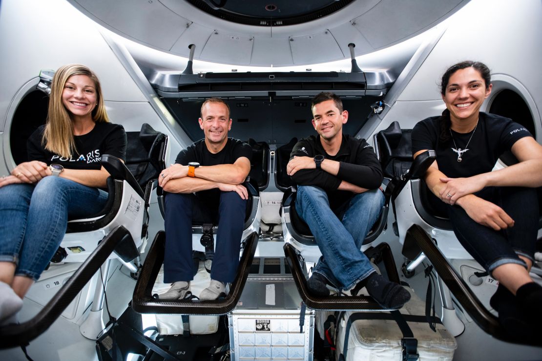 Polaris Dawn crew members — including, from left, Anna Menon, Scott Poteet, Jared Isaacman and Sarah Gillis — are seen inside a SpaceX Crew Dragon capsule.