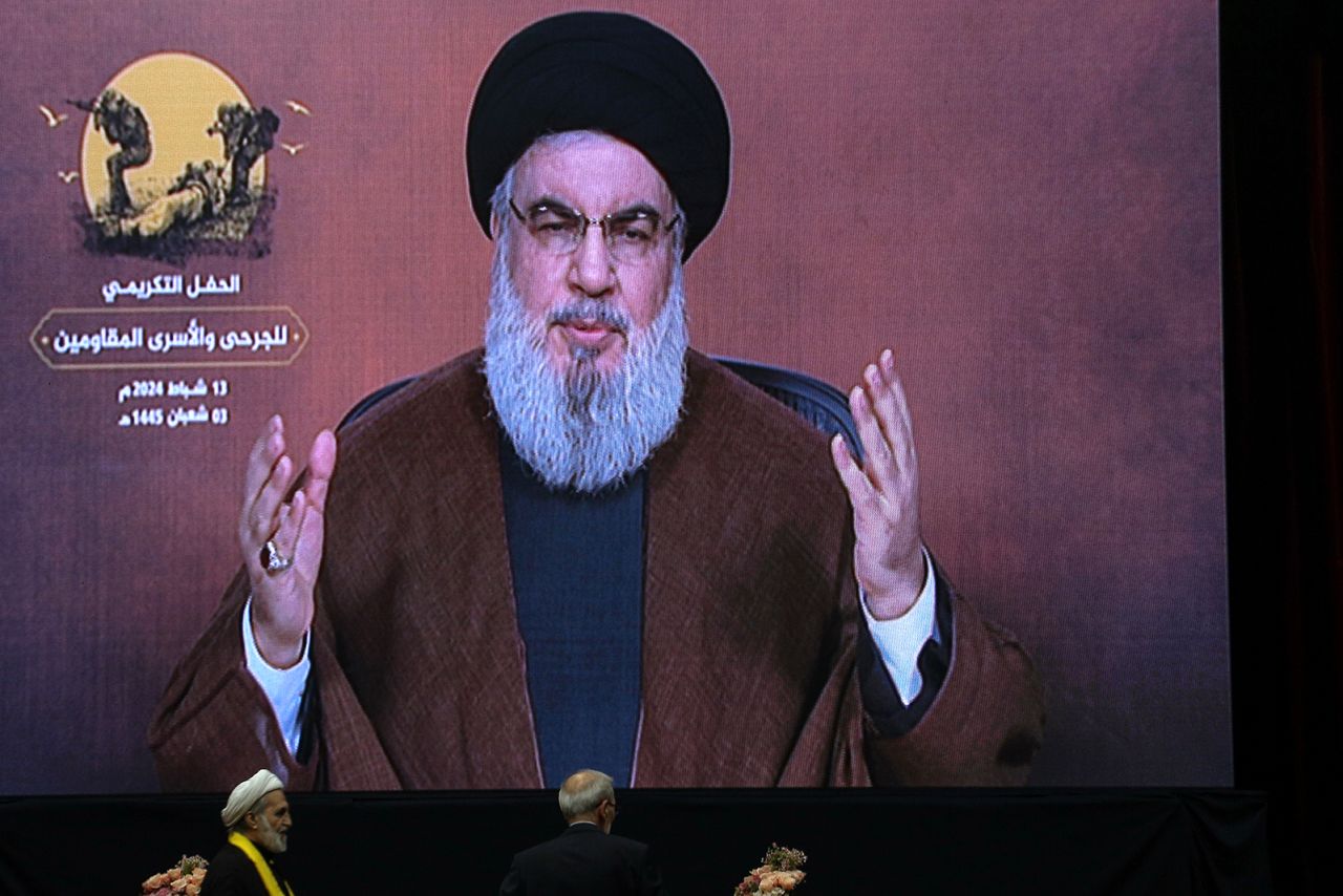 Hassan Nasrallah speaks via a video link during an event in Lebanon, Beirut on February 13. 