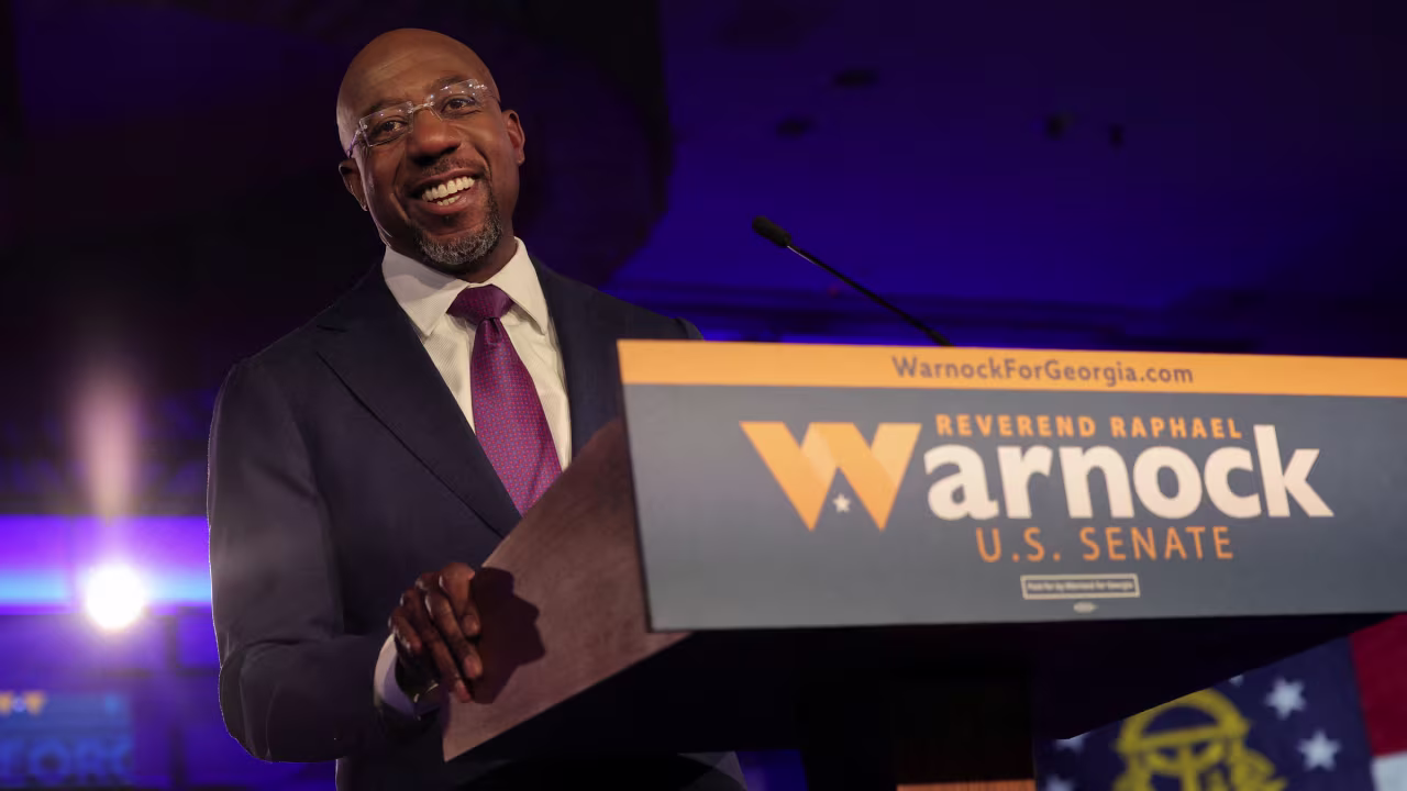 US Sen. Raphael Warnock speaks to supporters on Tuesday night.