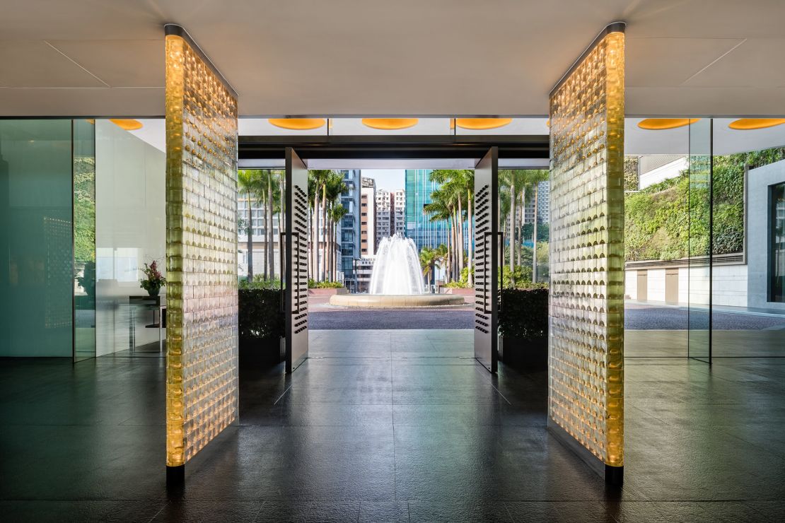 The Feng Shui fountain, a feature of the old Regent, helps drown out street noises for guests walking into the hotel.