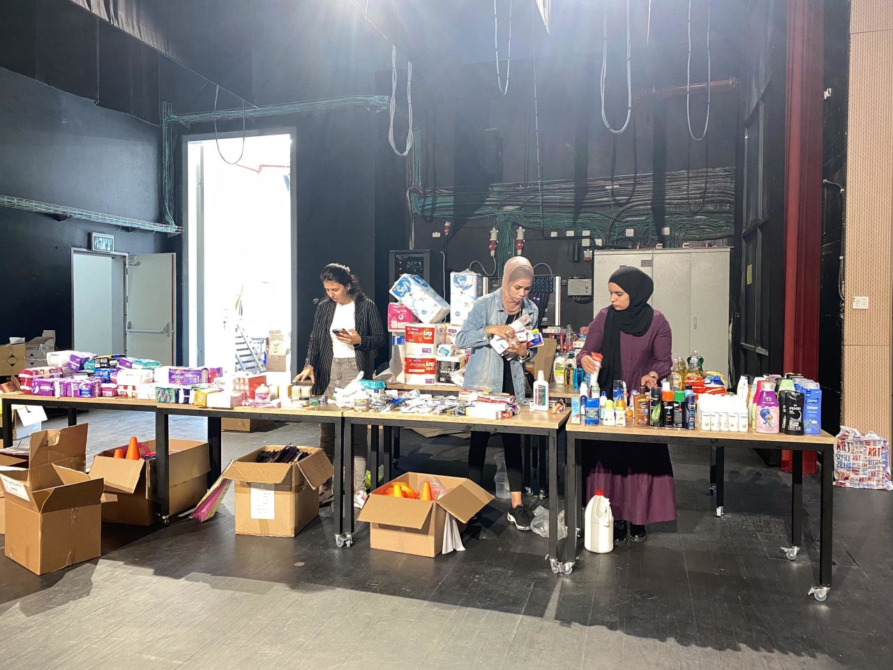 Volunteers prepare parcels to be sent to Bedouin families in southern Israel.