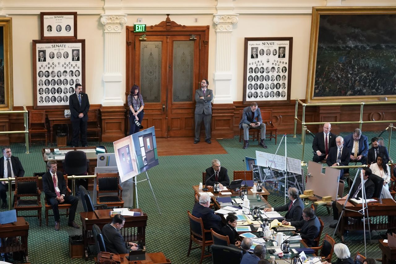 Col. Steven McCraw, seated center, testifies at a Texas Senate hearing at the state capitol, on June 21, in Austin, Texas. 