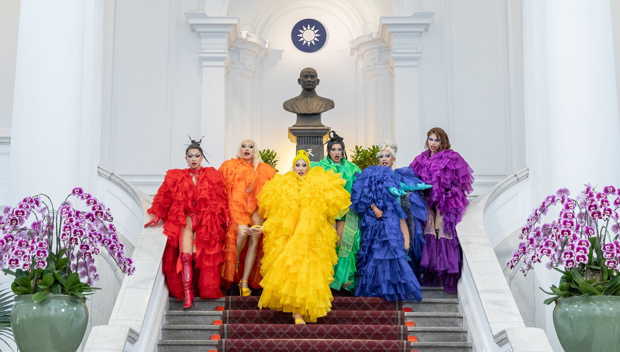 Drag queens, led by "RuPaul's Drag Race" winner Nymphia Wind, center, perform for Taiwan's outgoing leader Tsai Ing-wen at the presidential office in Taipei, Taiwan.