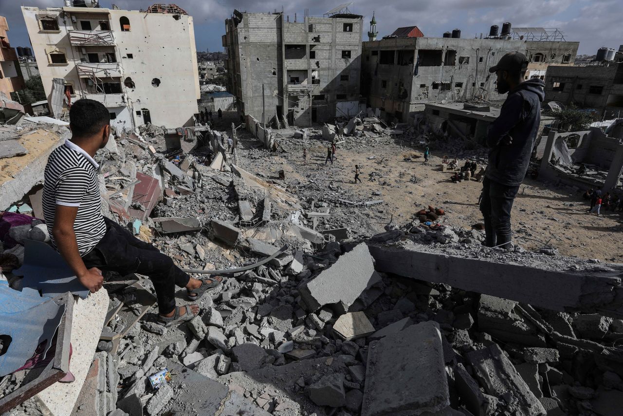 Palestinians inspect damage to homes after an Israeli airstrike near Rafah, Gaza, on May 5.