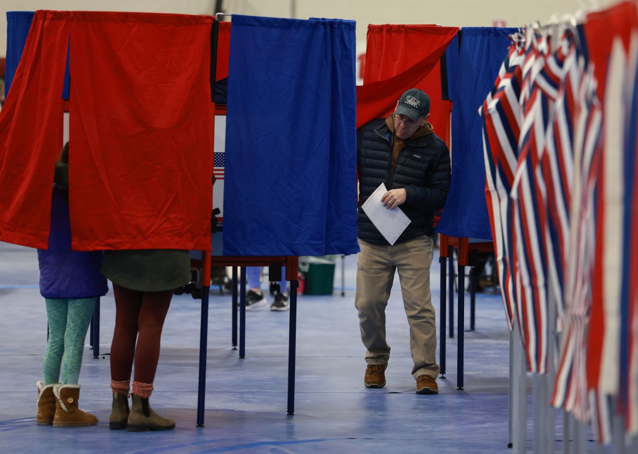 Voters fill out their ballots at a polling location in Bedford, New Hampshire.