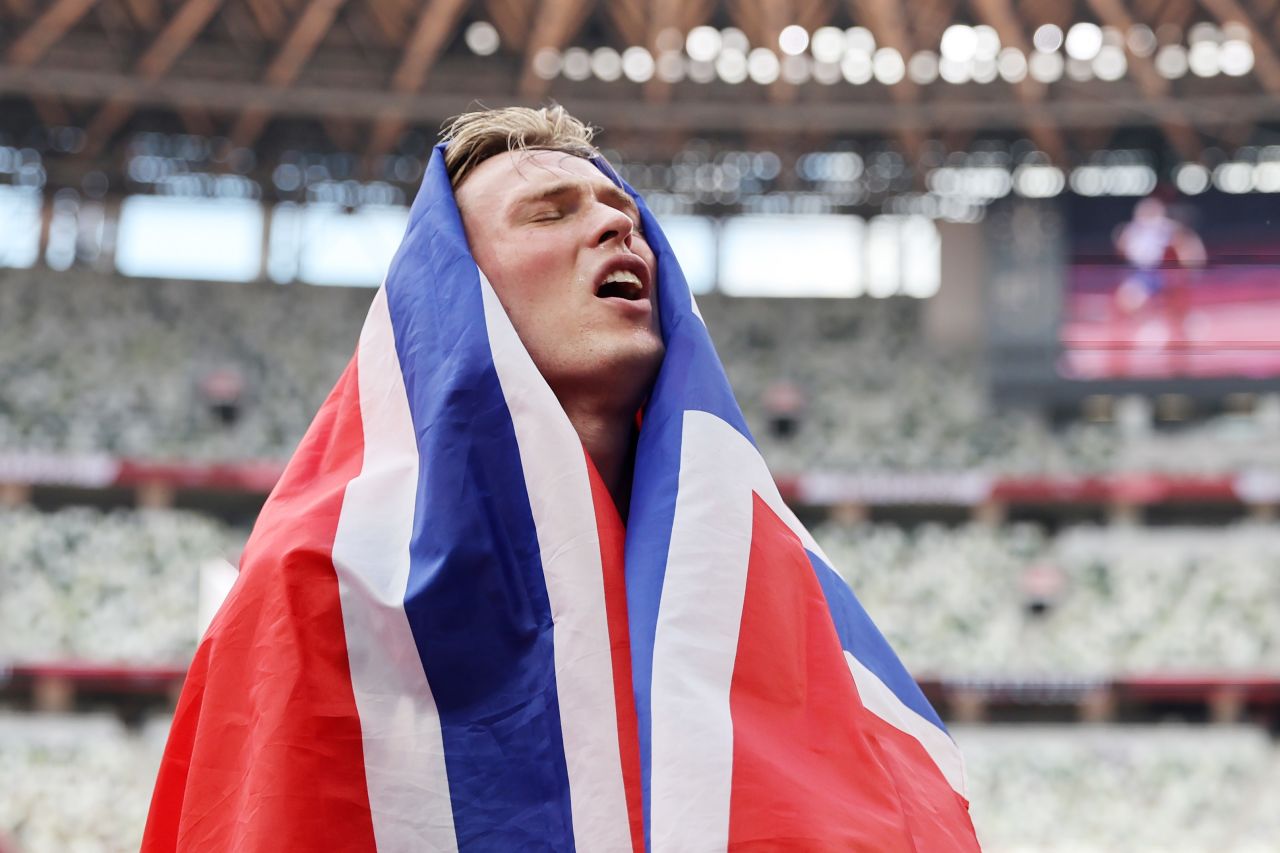 Norway's Karsten Warholm celebrates winning the gold medal in the 400 meters hurdles final on Tuesday.