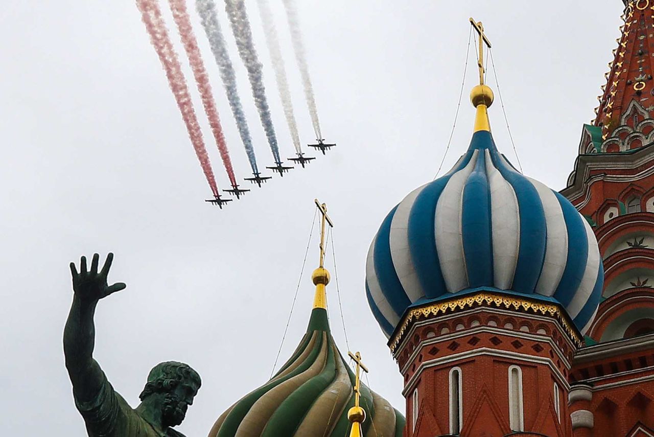 Jets flying in formation leave a trail in the Russian national colors over Red Square in Moscow, during a Victory Day air show on May 9.