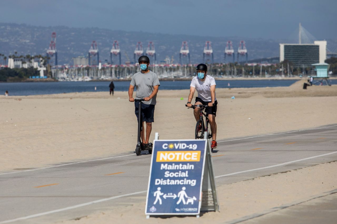 A sign about social distancing is seen on July 14 in Long Beach, California.