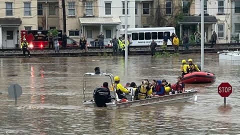 Firefighters evacuate students from Westernport Elementary in Maryland, on Tuesday, May 13, 2025.