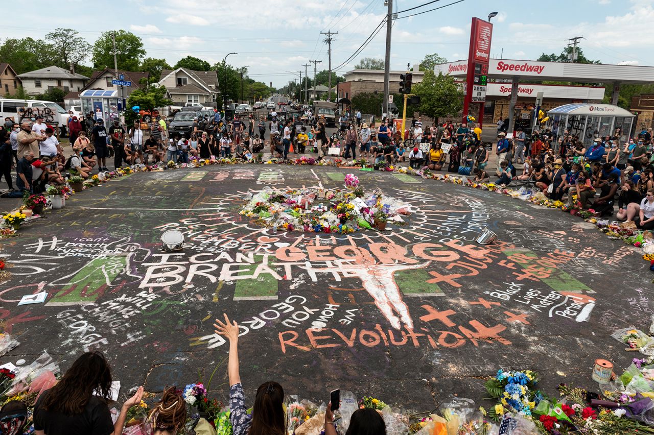 People gather at site where George Floyd died on June 1, in Minneapolis, Minnesota. 