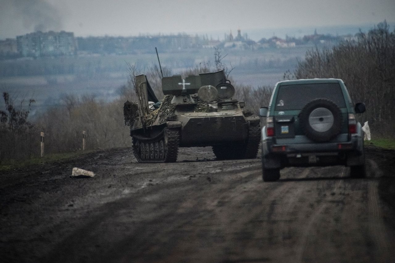 Ukrainian service members ride military vehicles near the front line city of?Bakhmut, Ukraine on April 6.