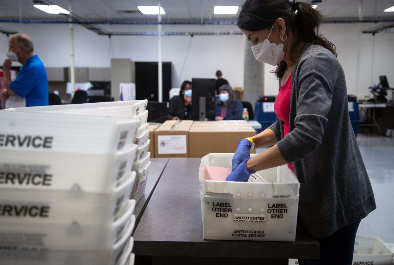 Maricopa County Elections employee Alba Parra tabulates early ballots at the Maricopa County Elections Headquarters in Phoenix, Arizona on November 4.