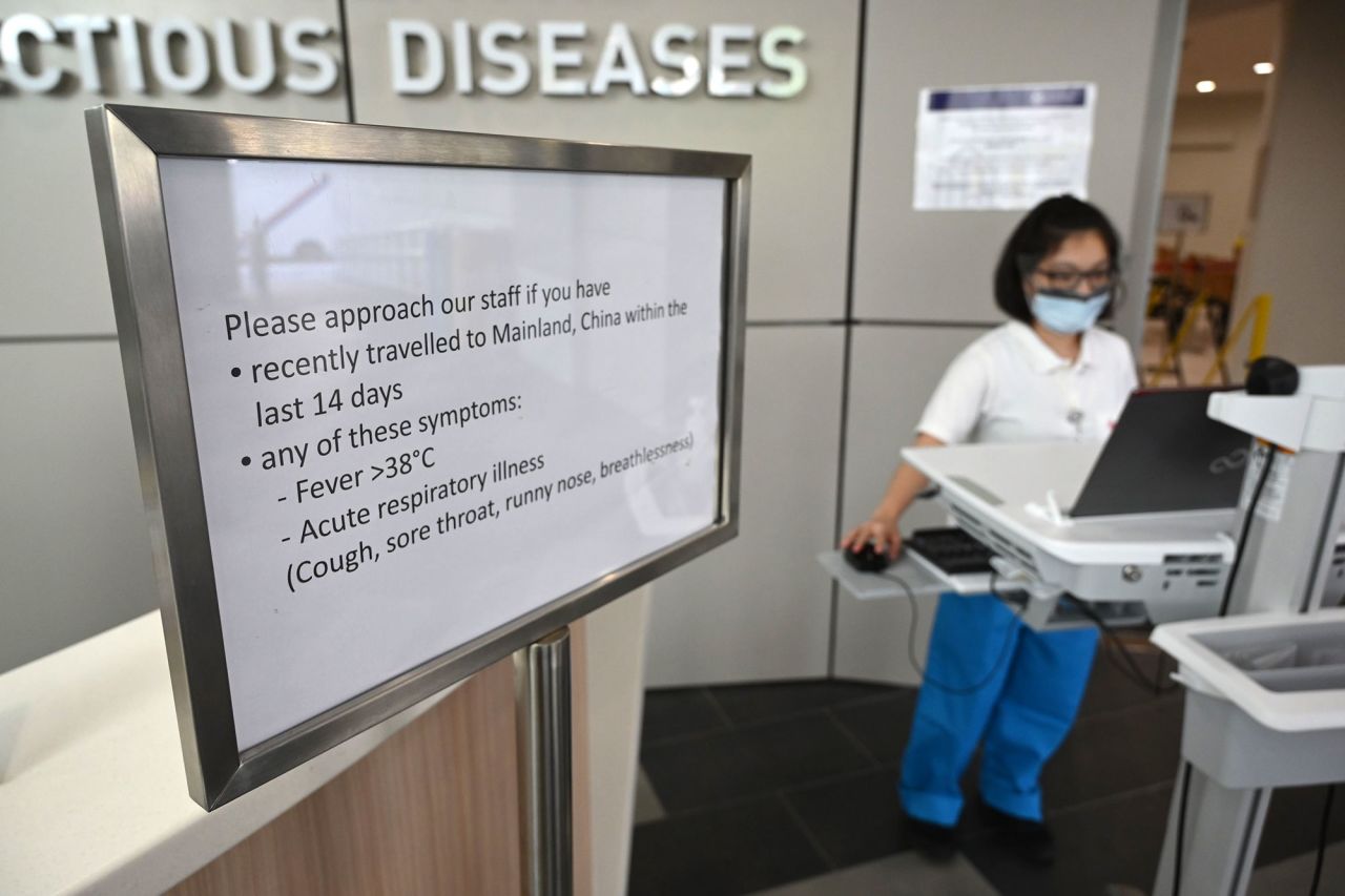 Medical staff prepare pre screening procedure at the National Centre for Infectious Diseases building at Tan Tock Seng Hospital in Singapore.