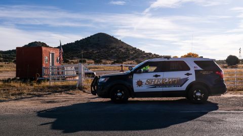 A Santa Fe County Sheriff's vehicle is seen at the entrance to the Bonanza Creek Ranch in Santa Fe, New Mexico, on Monday, October 25. 