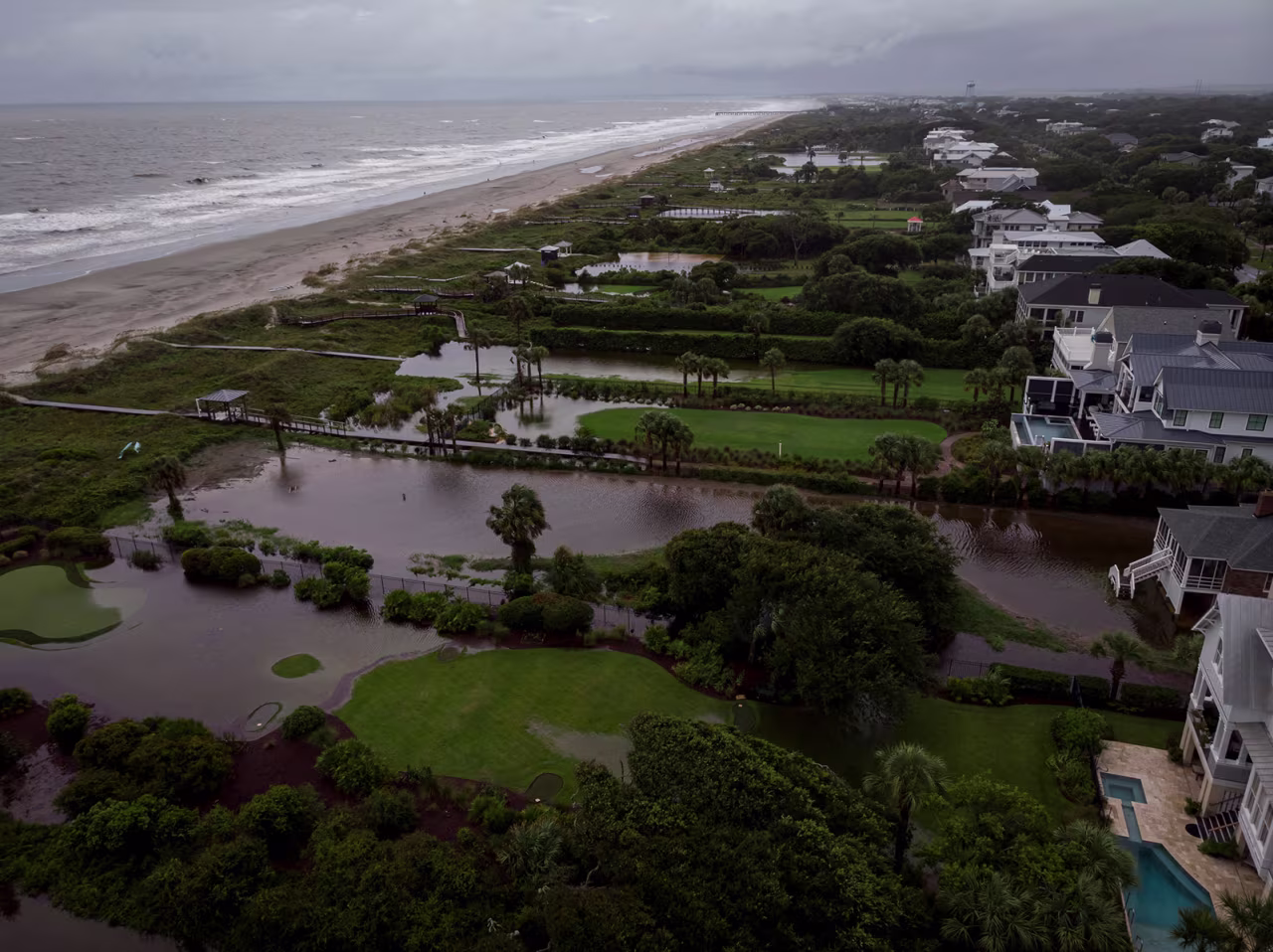 The yards of beachfront houses are flooded as Tropical Storm Debby moves to the North Atlantic, in Isle of Palms, South Carolina, on August 6. 
