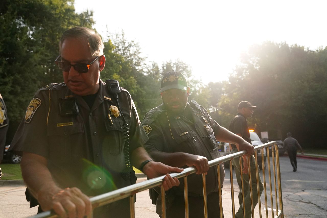 Authorities put up barricades outside of the Fulton County Jail on Thursday.