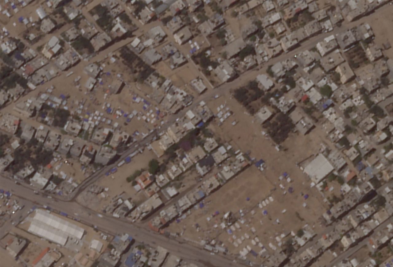 Since May 7, satellite images from Planet Labs show a mass exodus of Gazans from makeshift tent cities in Rafah as IDF ground operations continue in east Rafah. This image, taken on May 8, shows how many Gazans remain at one of the many camps in Rafah