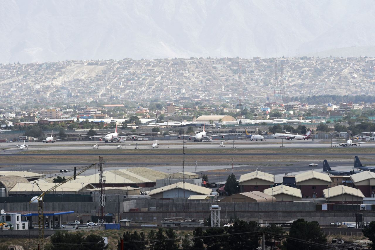 Aircraft are seen on the tarmac of Hamid Karzai International Airport?in Kabul on August 14.