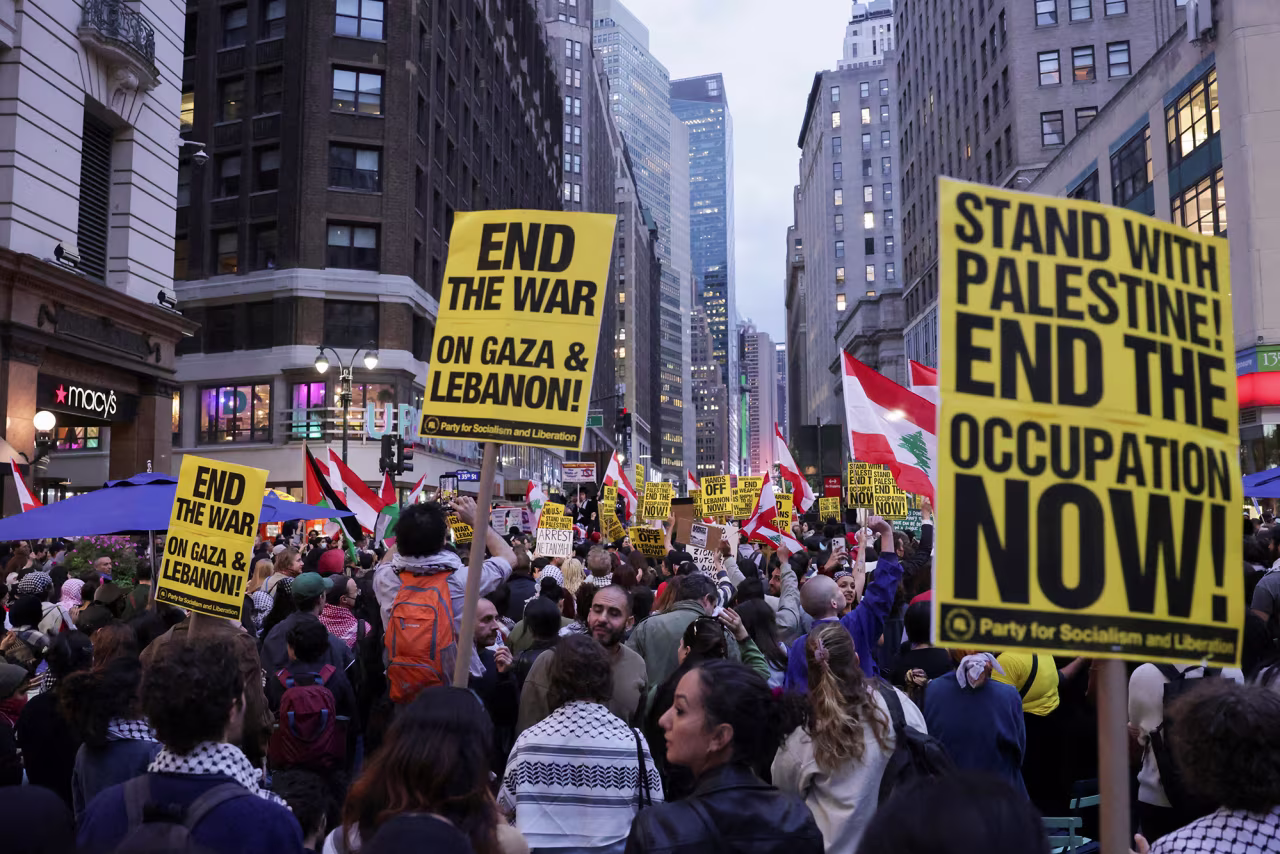 People gather to protest the escalation of conflict between Israel and Hezbollah, in New York City, on Tuesday.