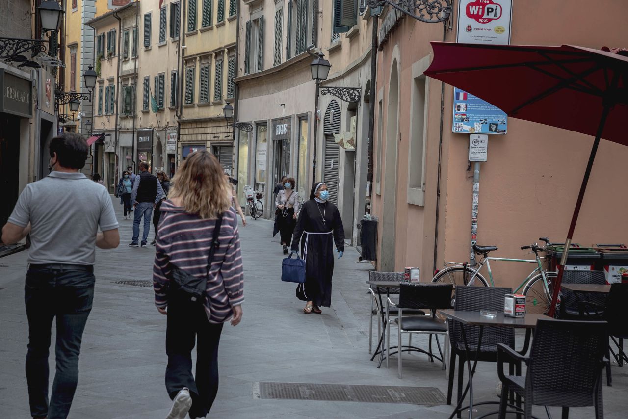 After a two-month coronavirus lockdown, people are seen on the streets of Pisa, Italy as the government gradually lifts sanitary restrictions on Monday, May 18.?