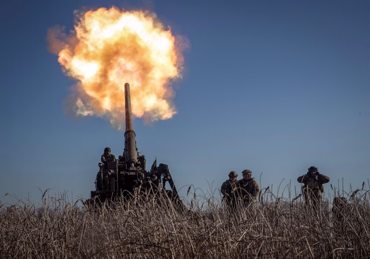 Ukrainian servicemen fire a 2S7 Pion self-propelled gun toward Russian positions on a frontline near Bakhmut in Donetsk region, Ukraine, on January 24. 