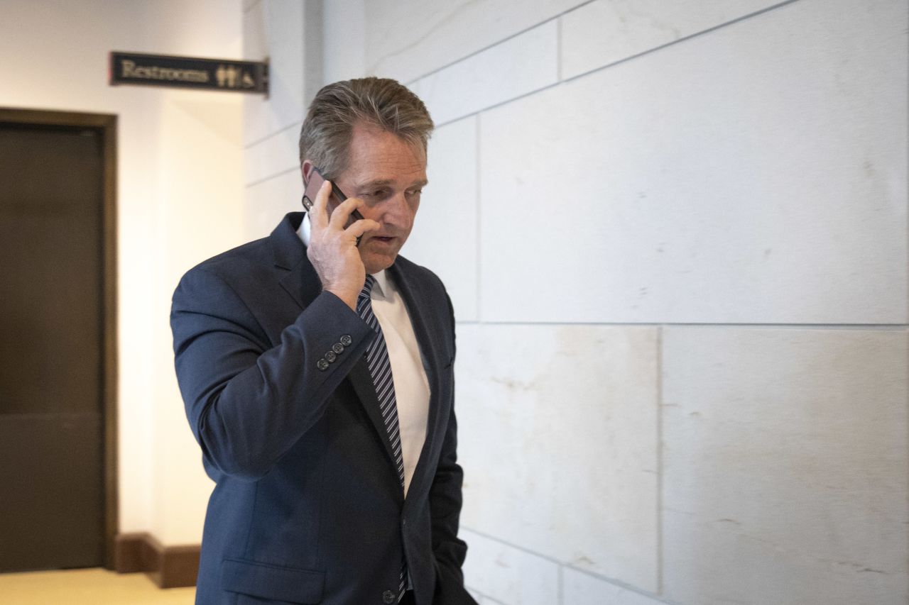 Sen. Jeff Flake arrives at the Office of Senate Security, which houses a 'sensitive compartmented information facility,' or SCIF, where Senators are able to view the report about alleged sexual assaults by Supreme Court nominee Judge Brett Kavanaugh.