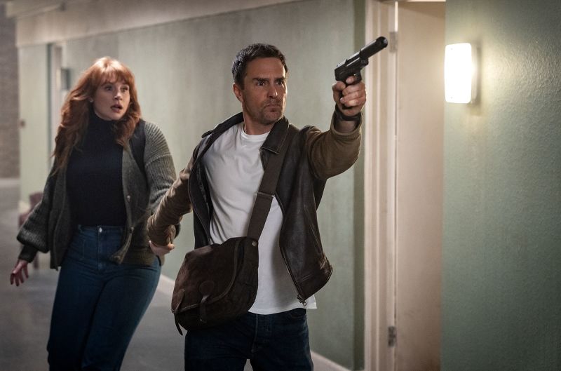 Bryce Dallas Howard and Sam Rockwell as an author and spy, respectively, in