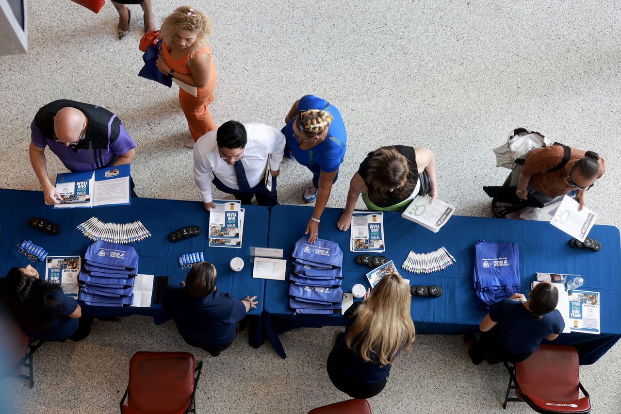 Job seekers attends the JobNewsUSA.com South Florida Job Fair held at the Amerant Bank Arena on June 26 in Sunrise, Florida.?